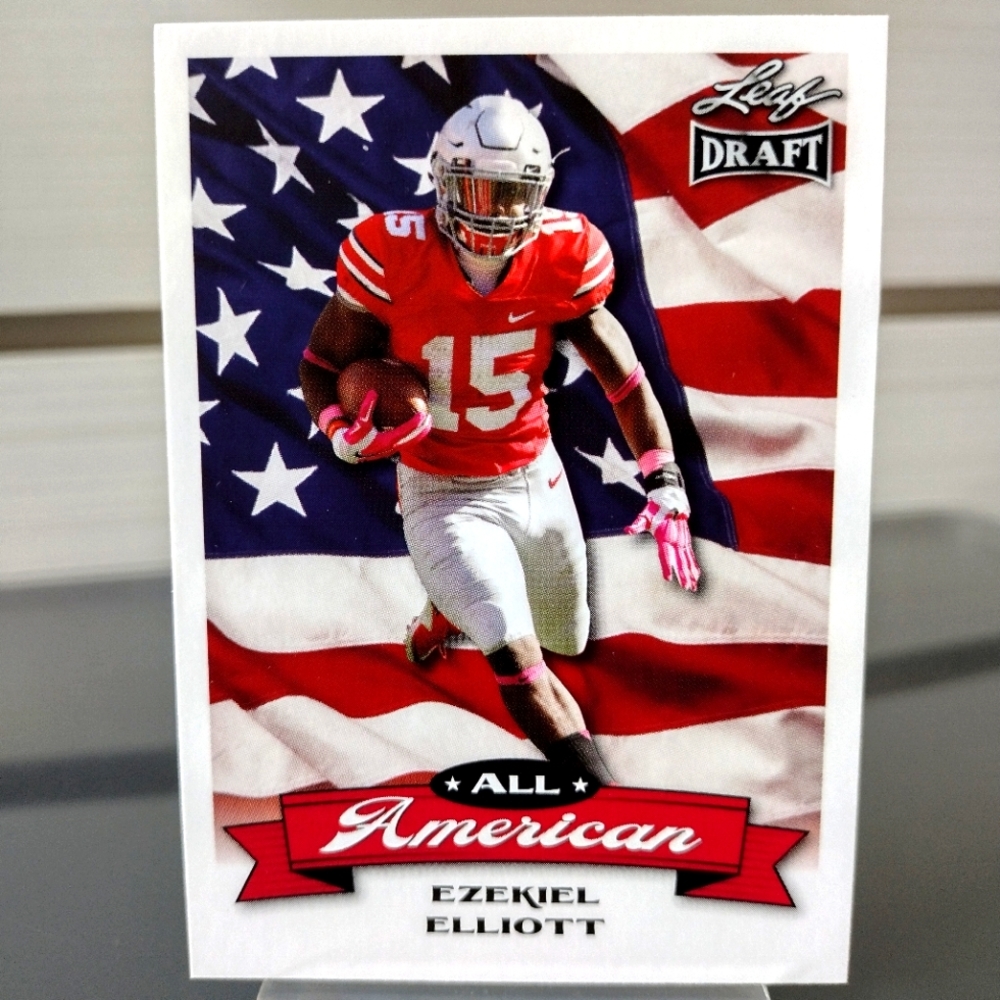 (Ezekiel Elliott) (2 Card Lot) of (2016 Leaf & 2021 Prestige) In Mint Condition.